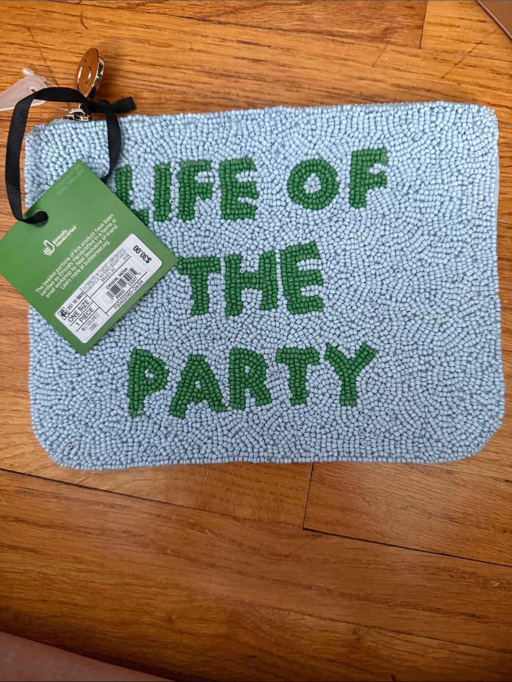 kate spade Light Blue Beaded "Life of the Party" Wristlet with Green Text